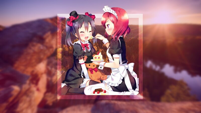 Two Girls Feeding Cake