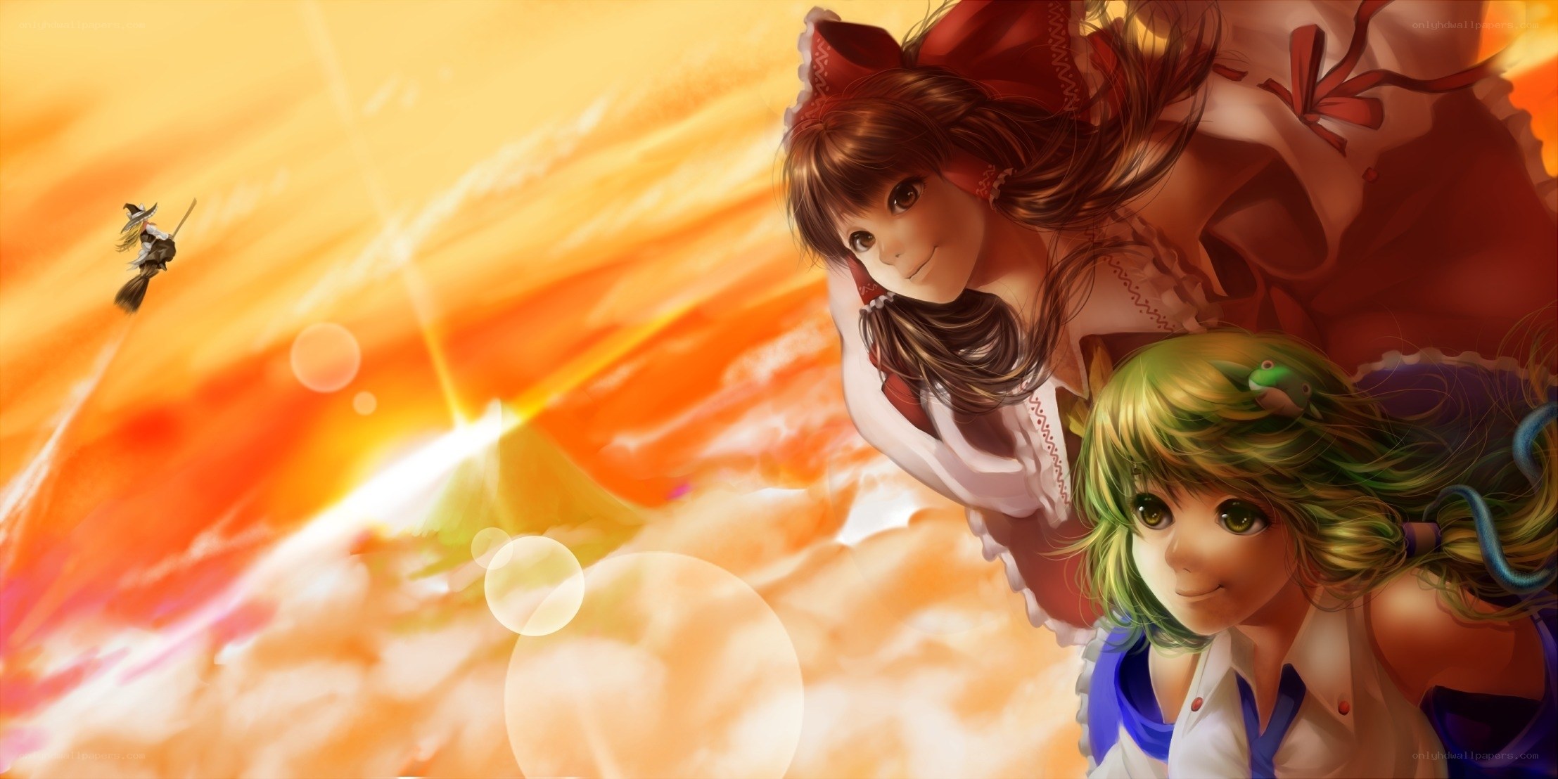 Two girls flying in sunset
