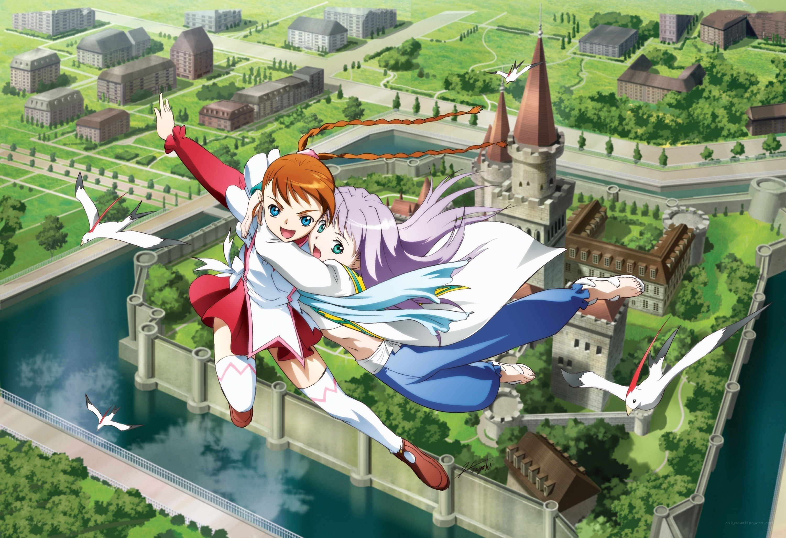 Two girls flying over a city