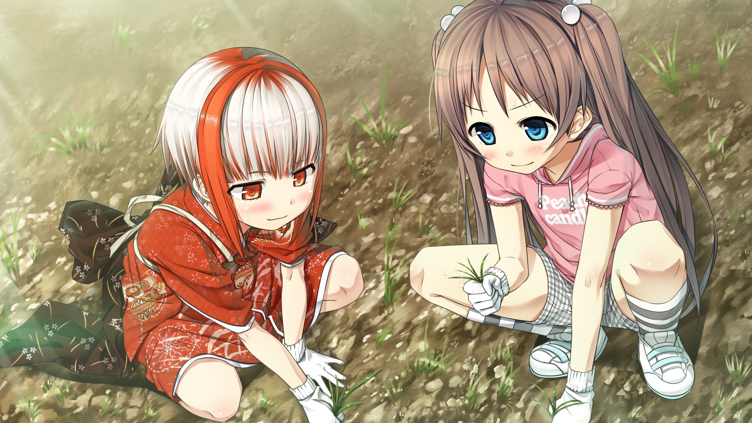 Two girls gardening together