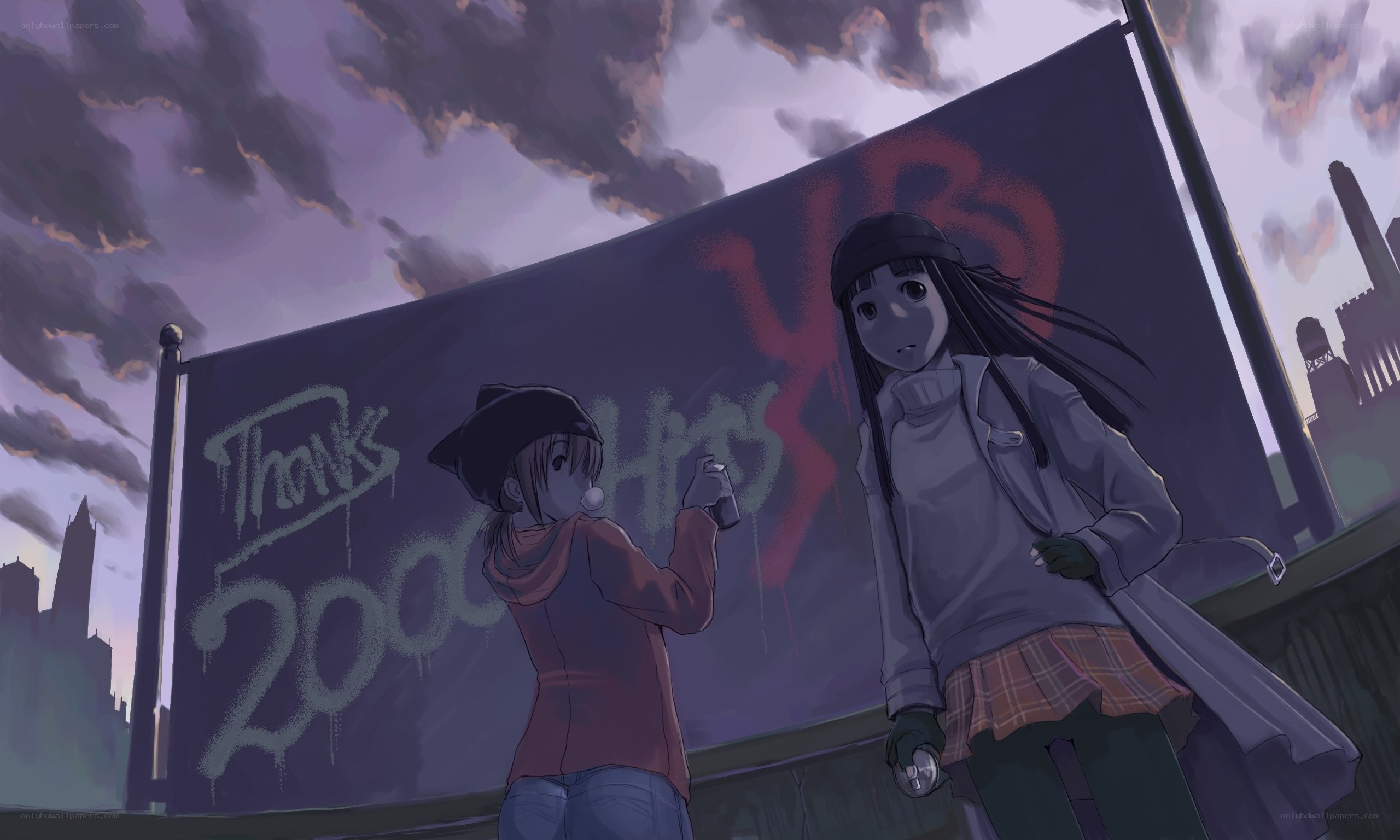 Two girls graffitiing a billboard