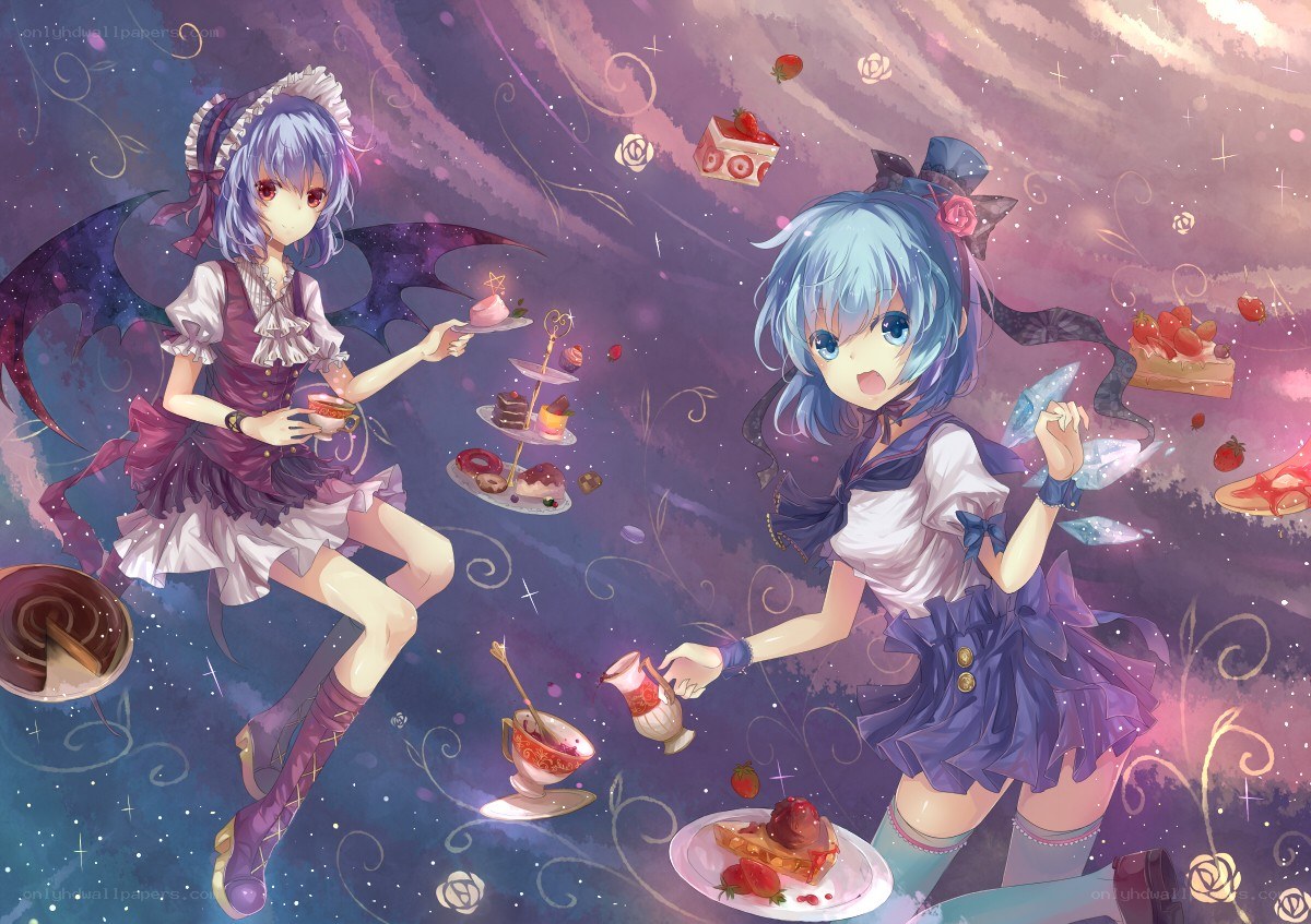 Two girls having a tea party