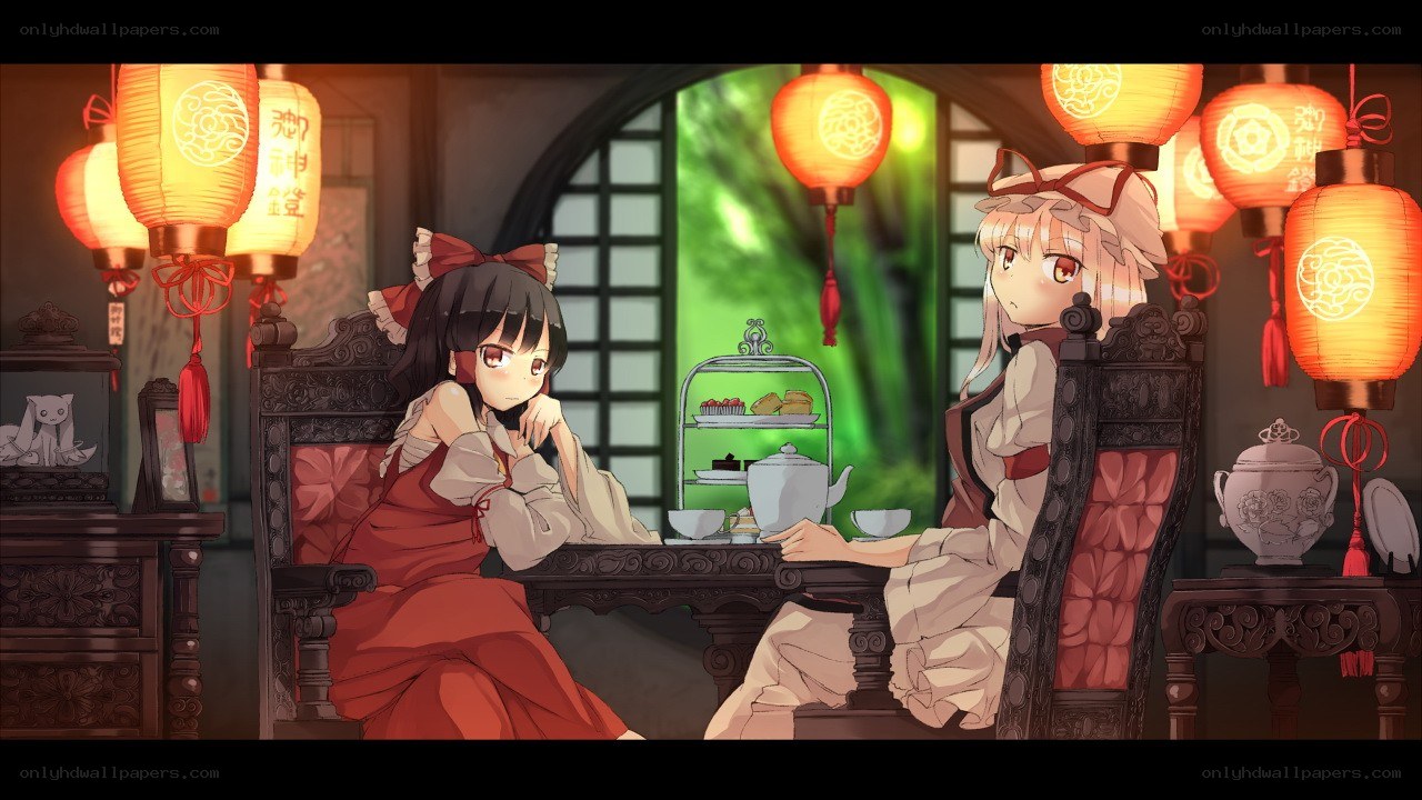 Two girls having tea