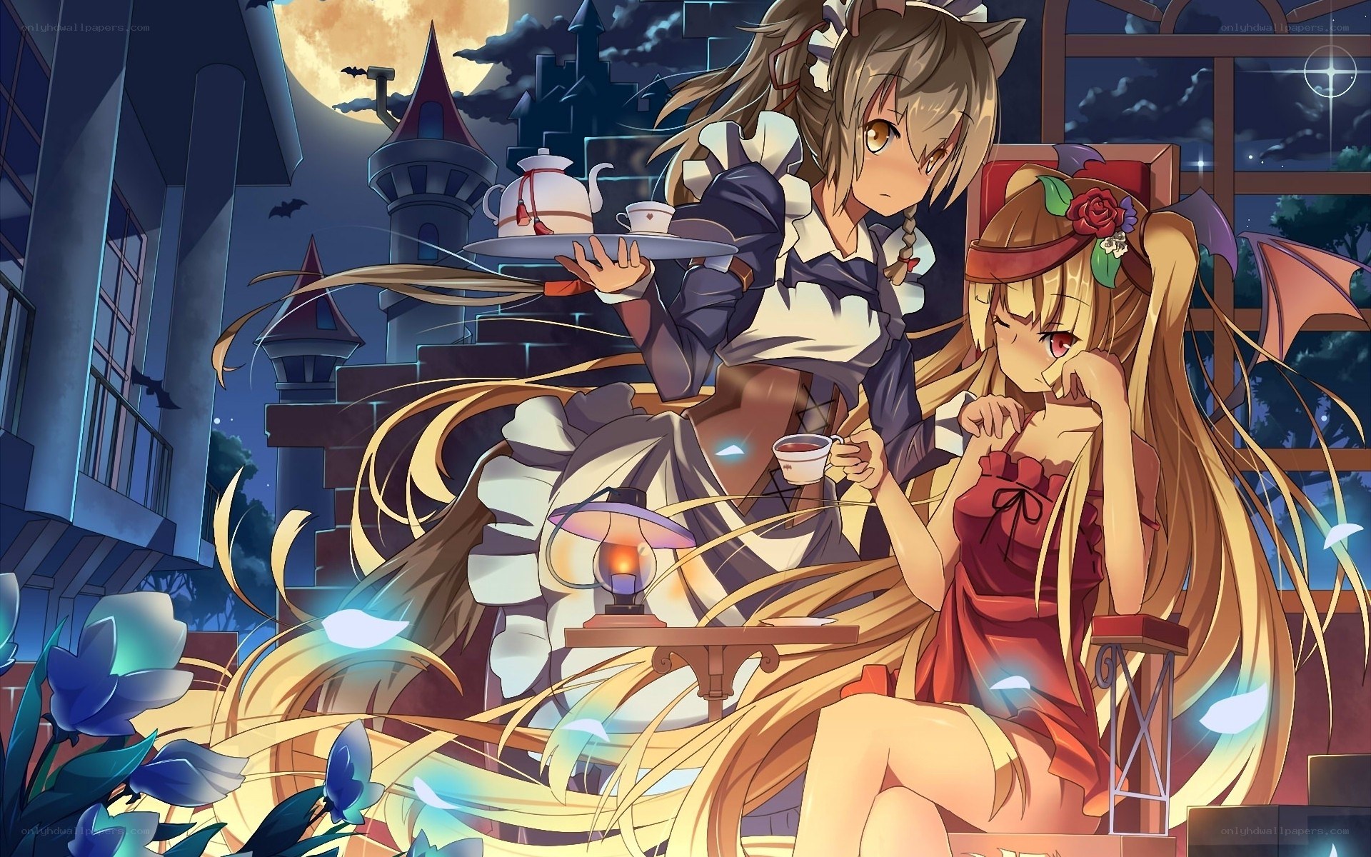 Two girls having tea at night