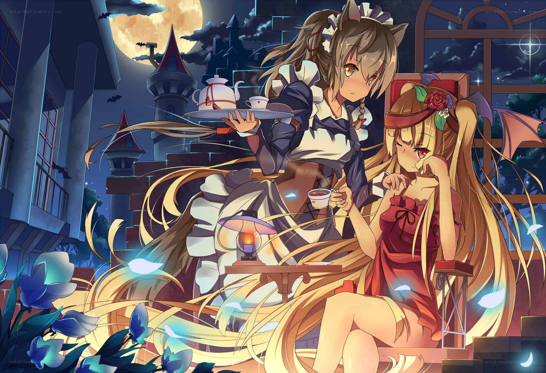 Two girls having tea at night