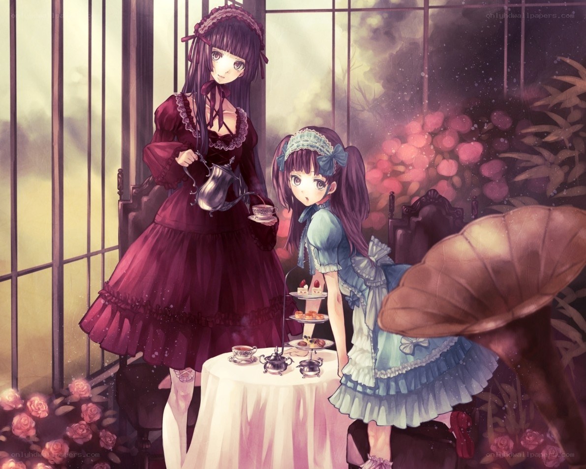 Two girls having tea in a garden