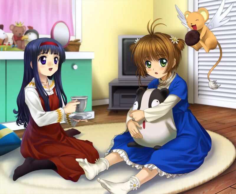 Two girls having tea time