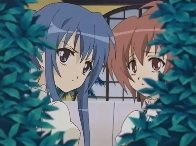 Two Girls Hiding Behind Bush