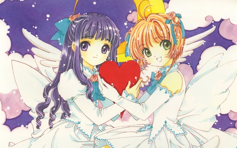 Two girls holding a heart