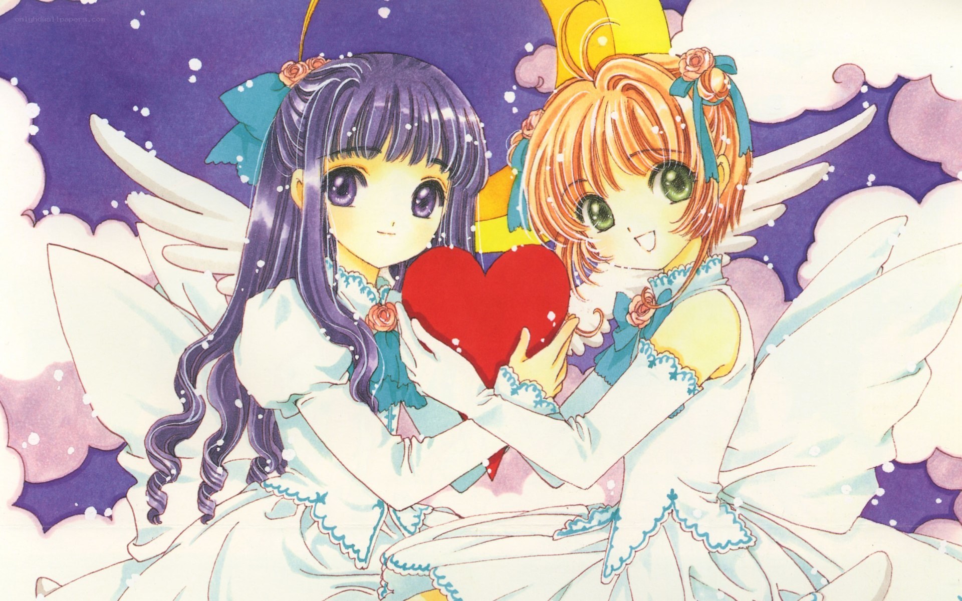 Two girls holding a heart
