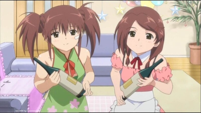 Two girls holding bottles