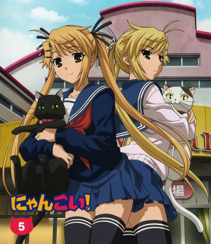 Two Girls Holding Cats