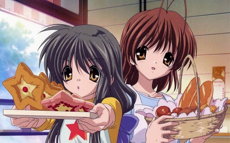 Two Girls Holding Food