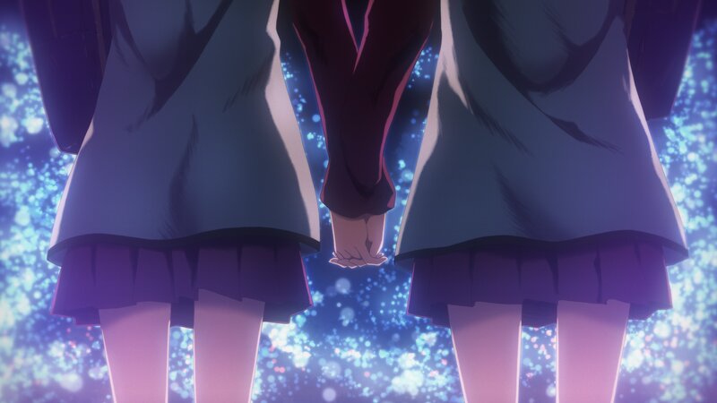 two girls holding hands