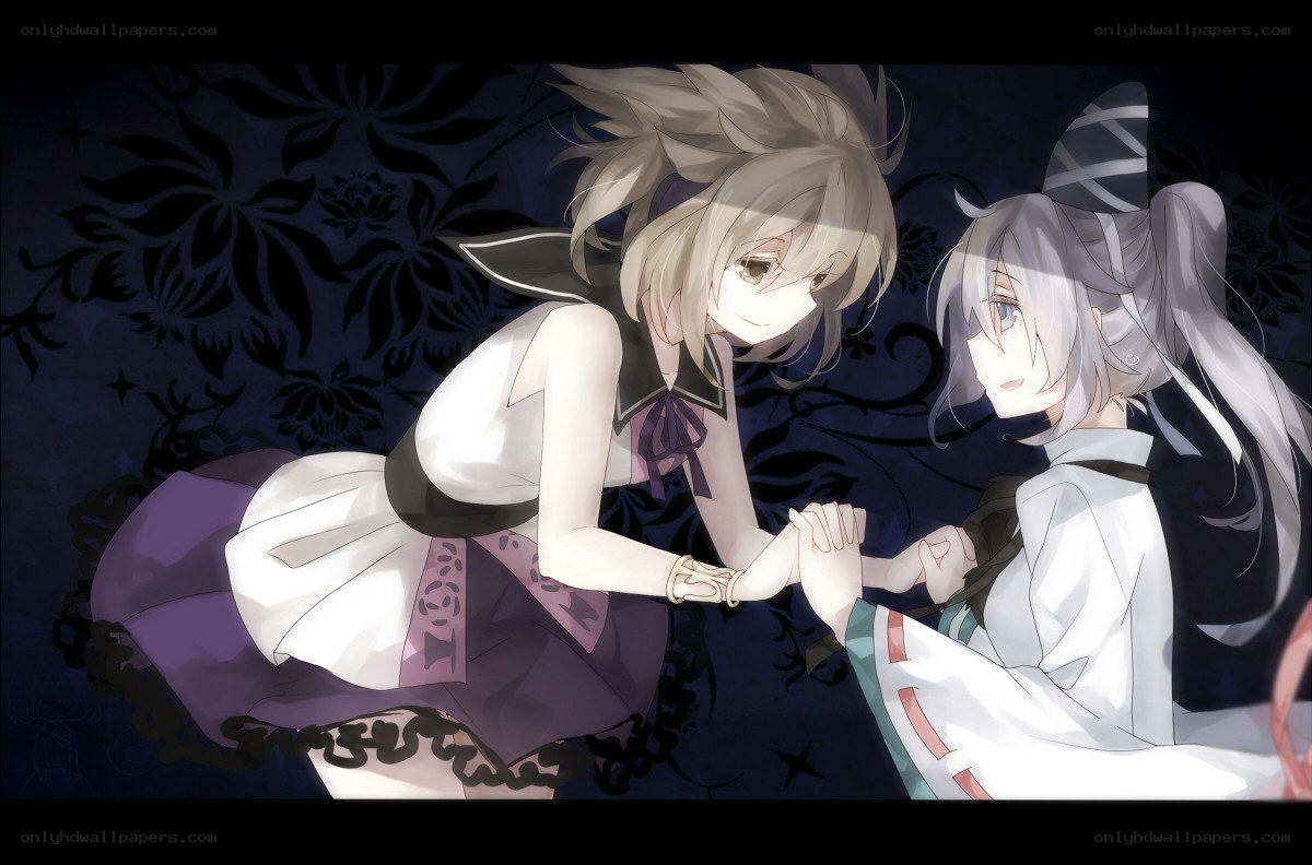 two girls holding hands