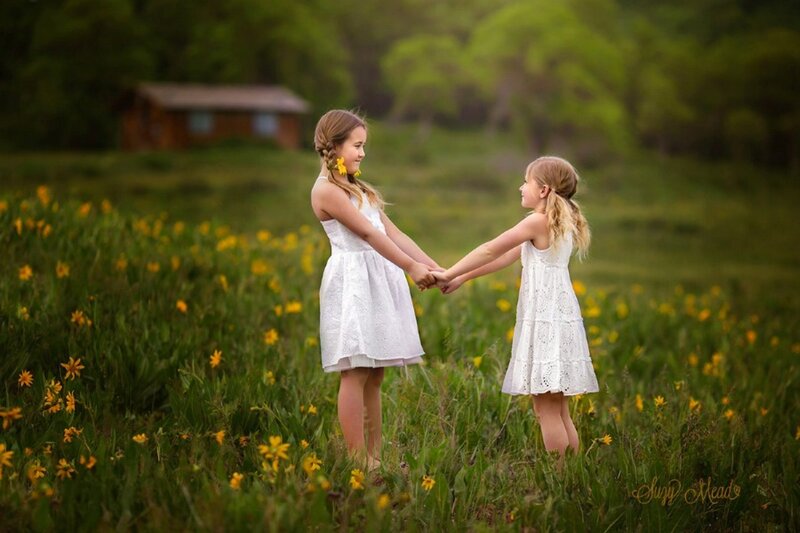 Two Girls Holding Hands — Green, Serene, Afternoon, Photograph