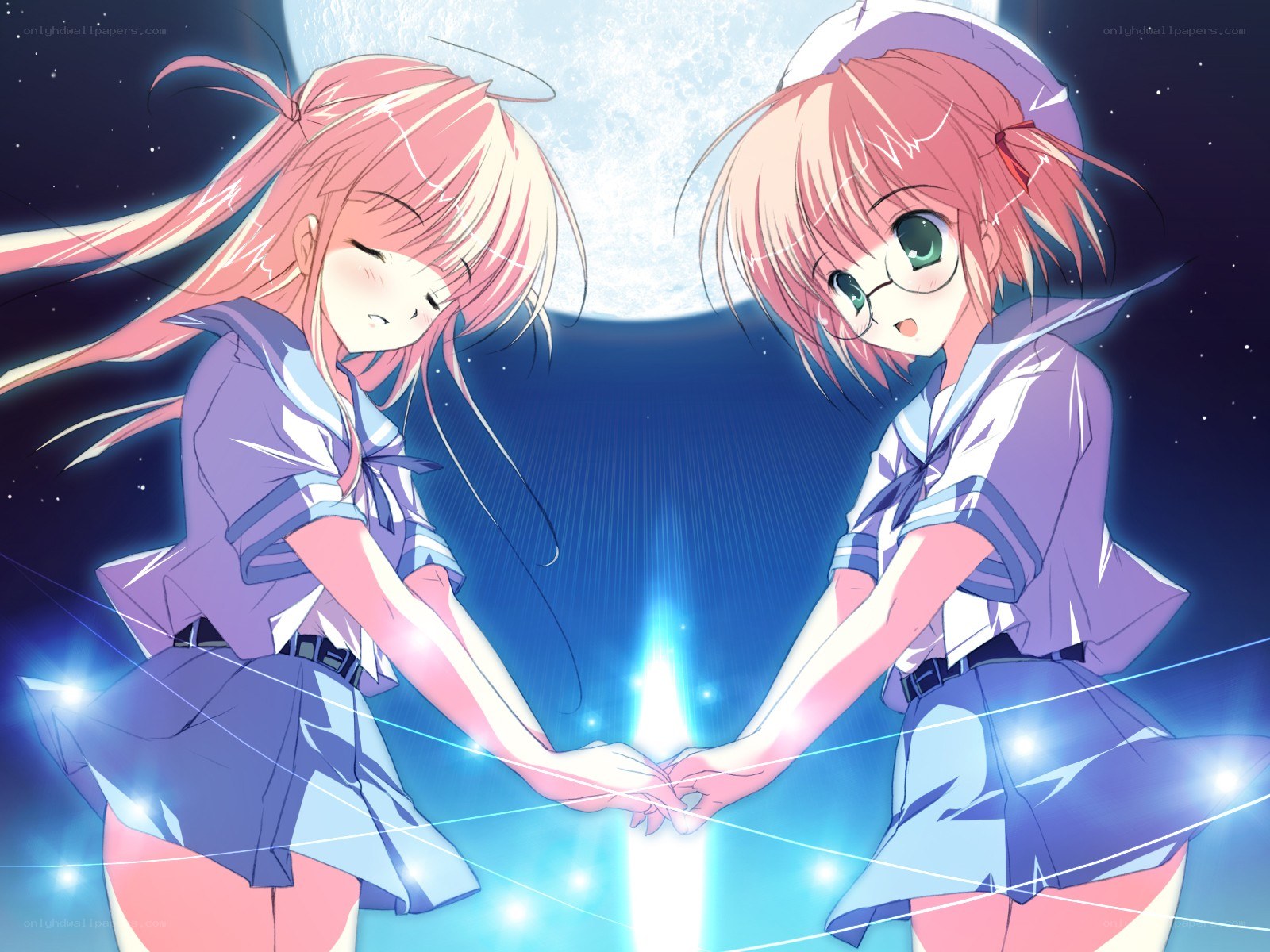 Two girls holding hands under moonlight