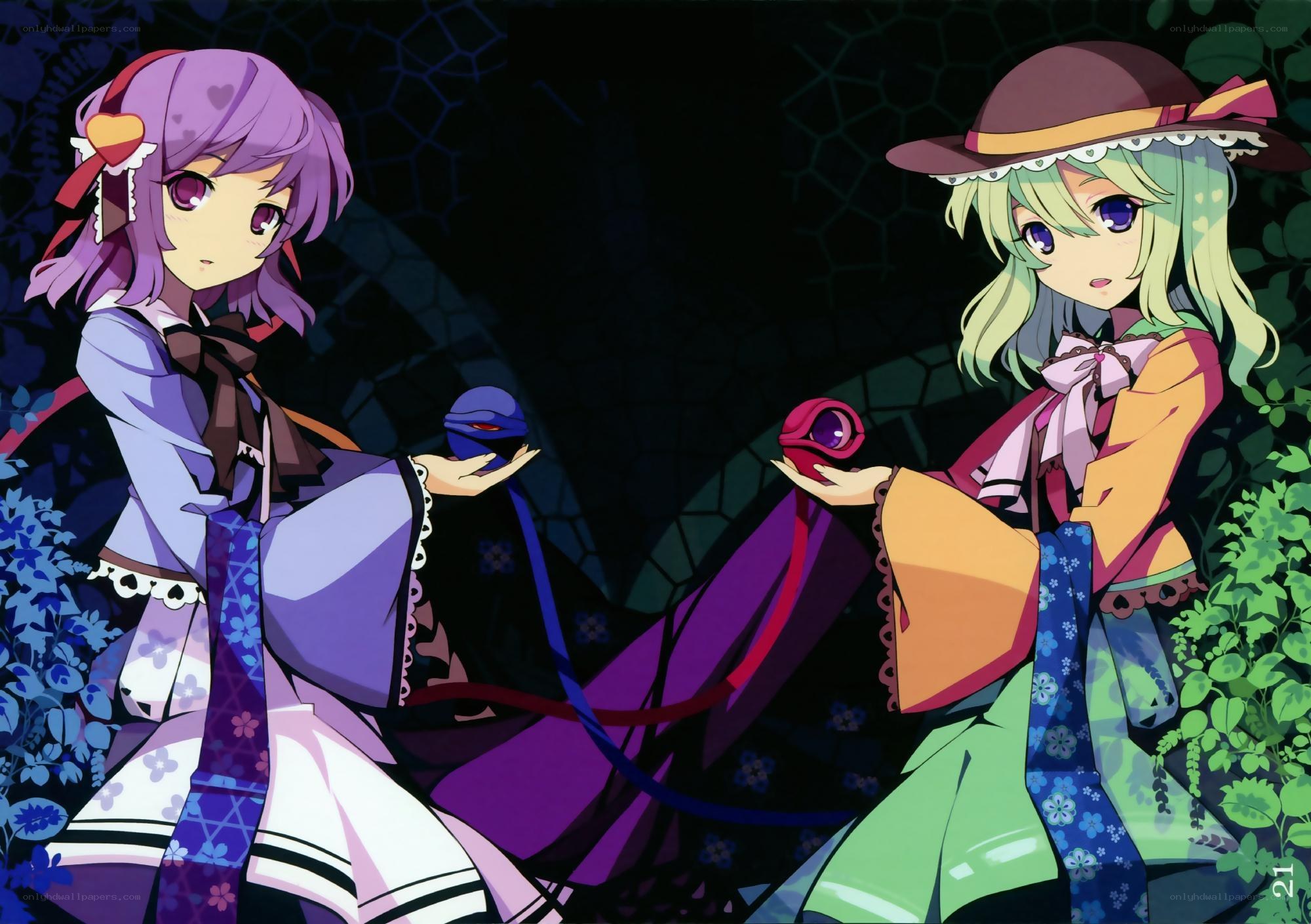 two girls holding orbs