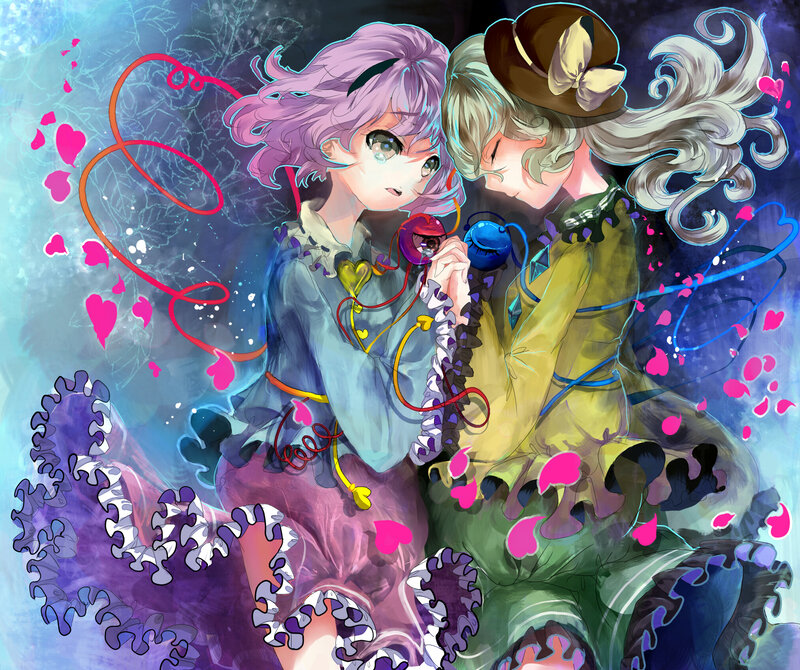 Two Girls Holding Phones