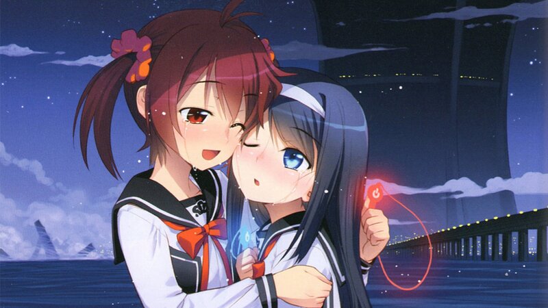 Two girls hugging at night