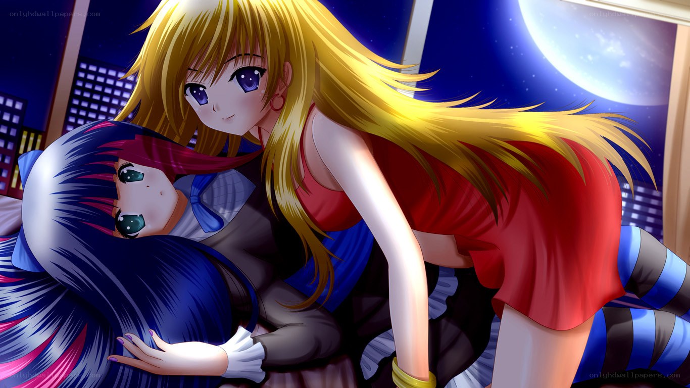 Two girls hugging at night