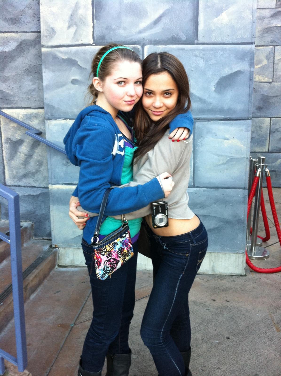 two girls hugging at theme park
