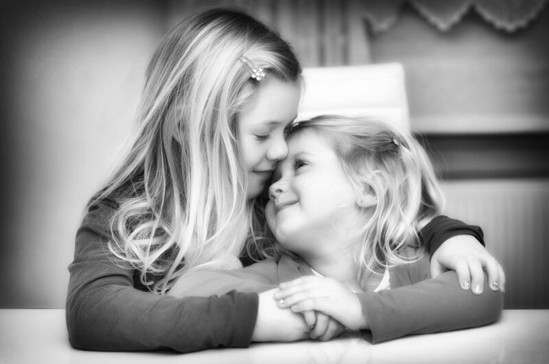 Two Girls Hugging — Black, Affectionate