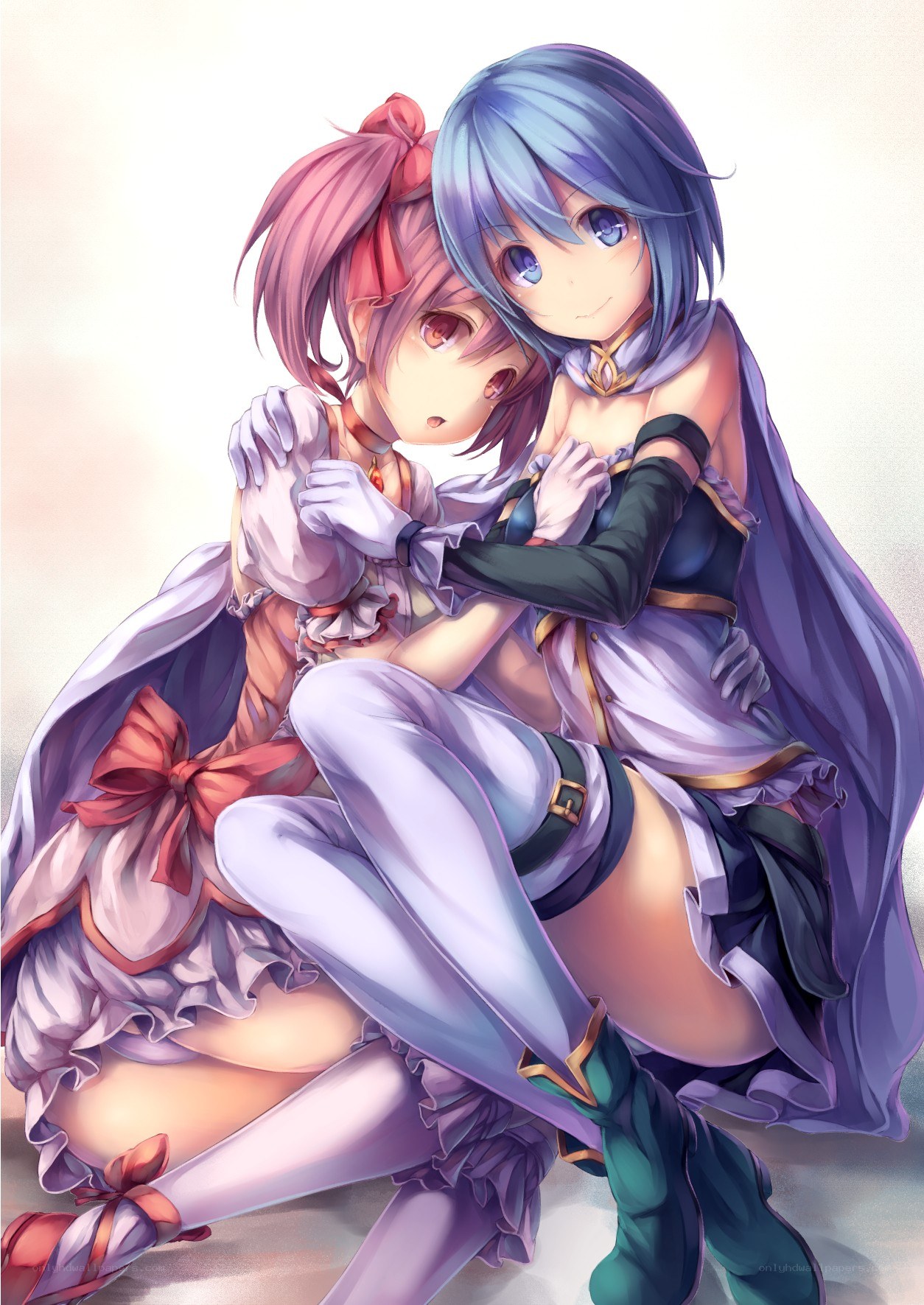 Two girls hugging closely