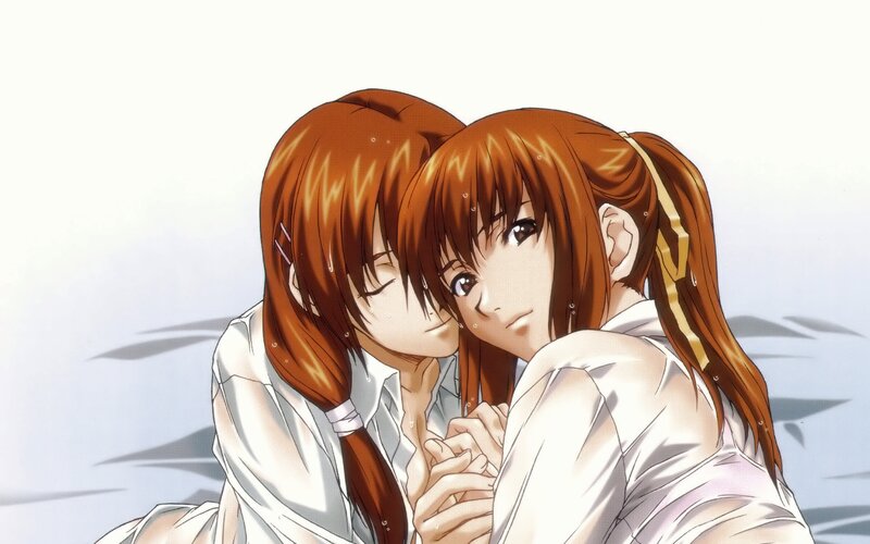 two girls hugging closely