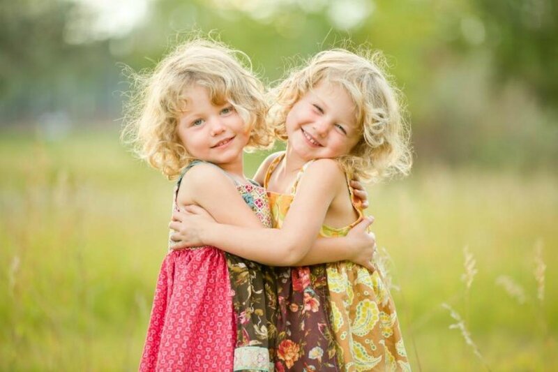 Two Girls Hugging — Green, Happy