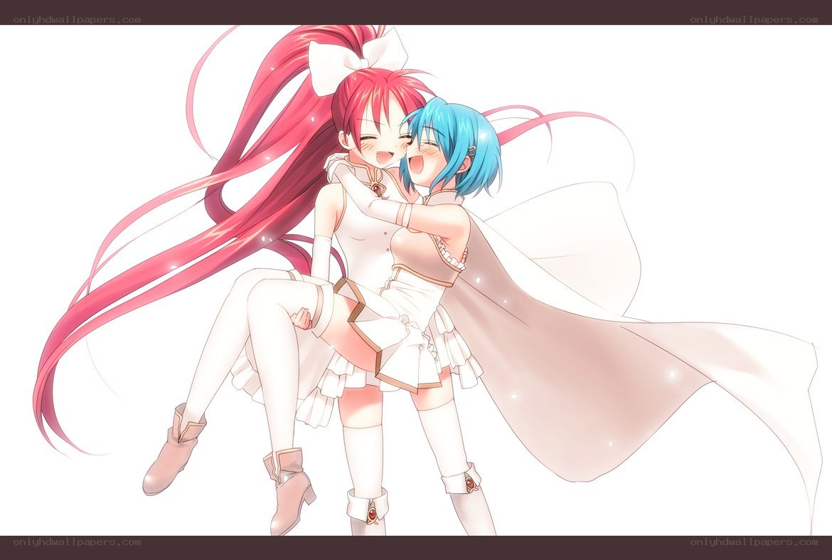 Two girls hugging happily