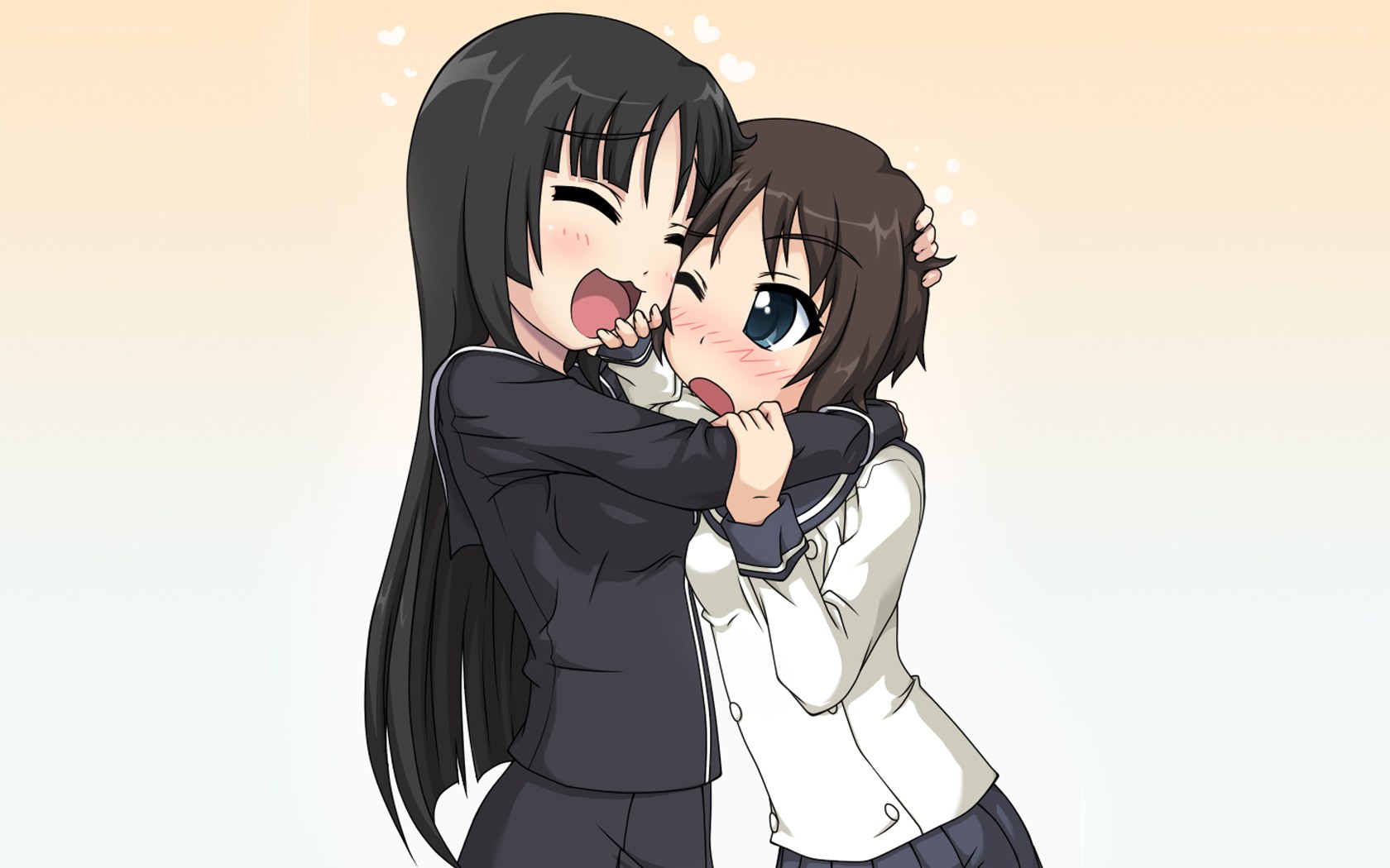 Two girls hugging happily