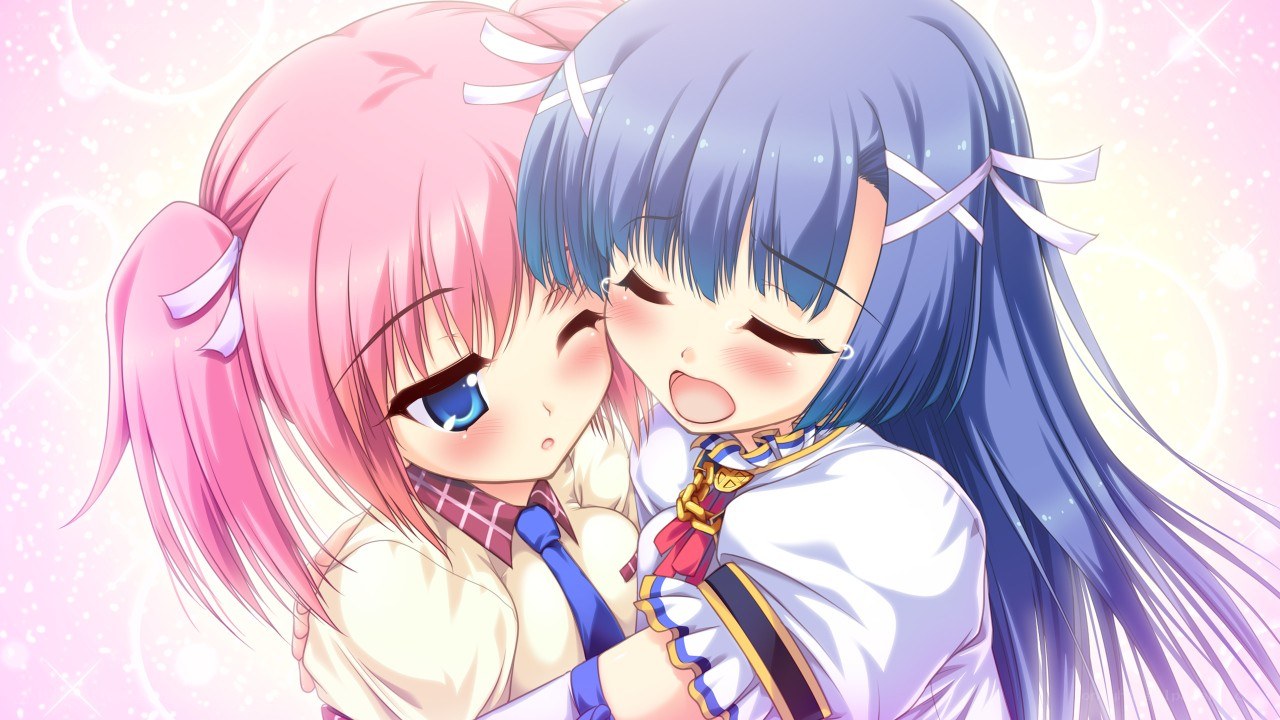 Two girls hugging happily