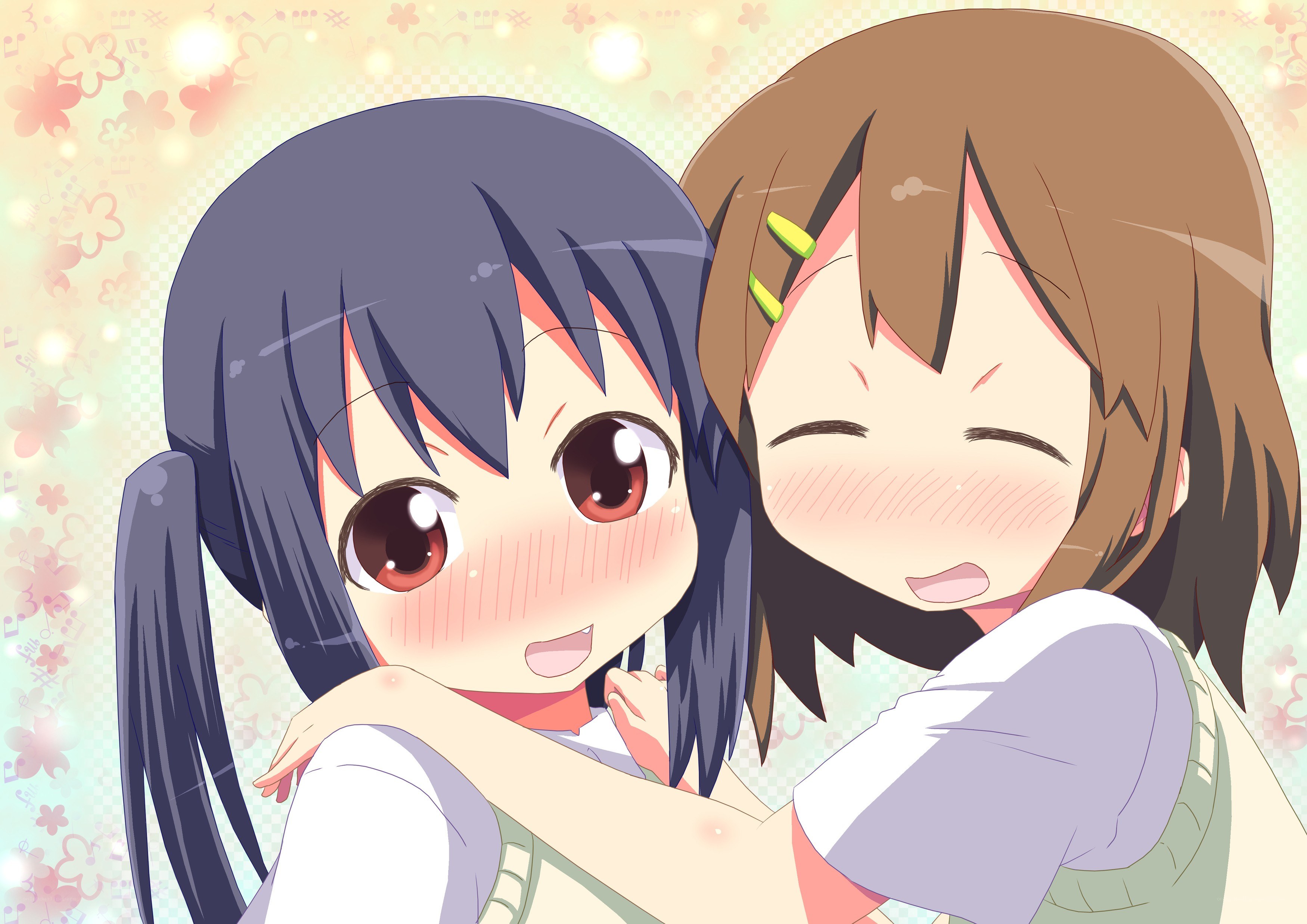 Two girls hugging happily