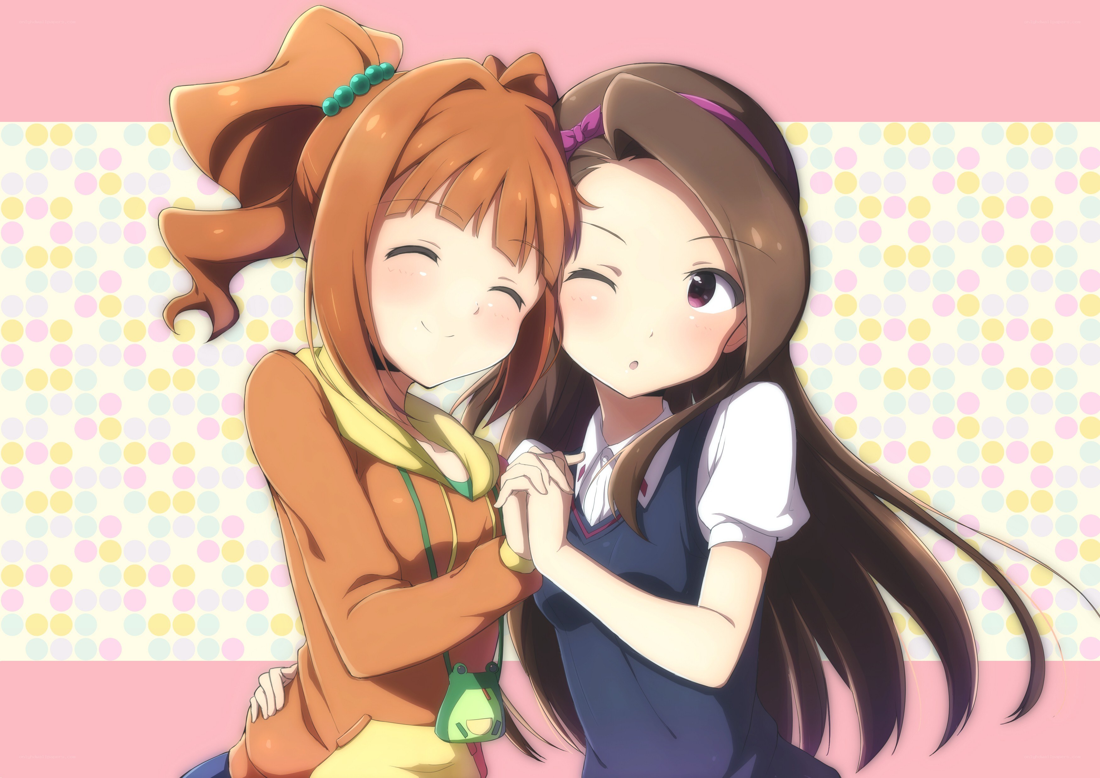 Two girls hugging happily