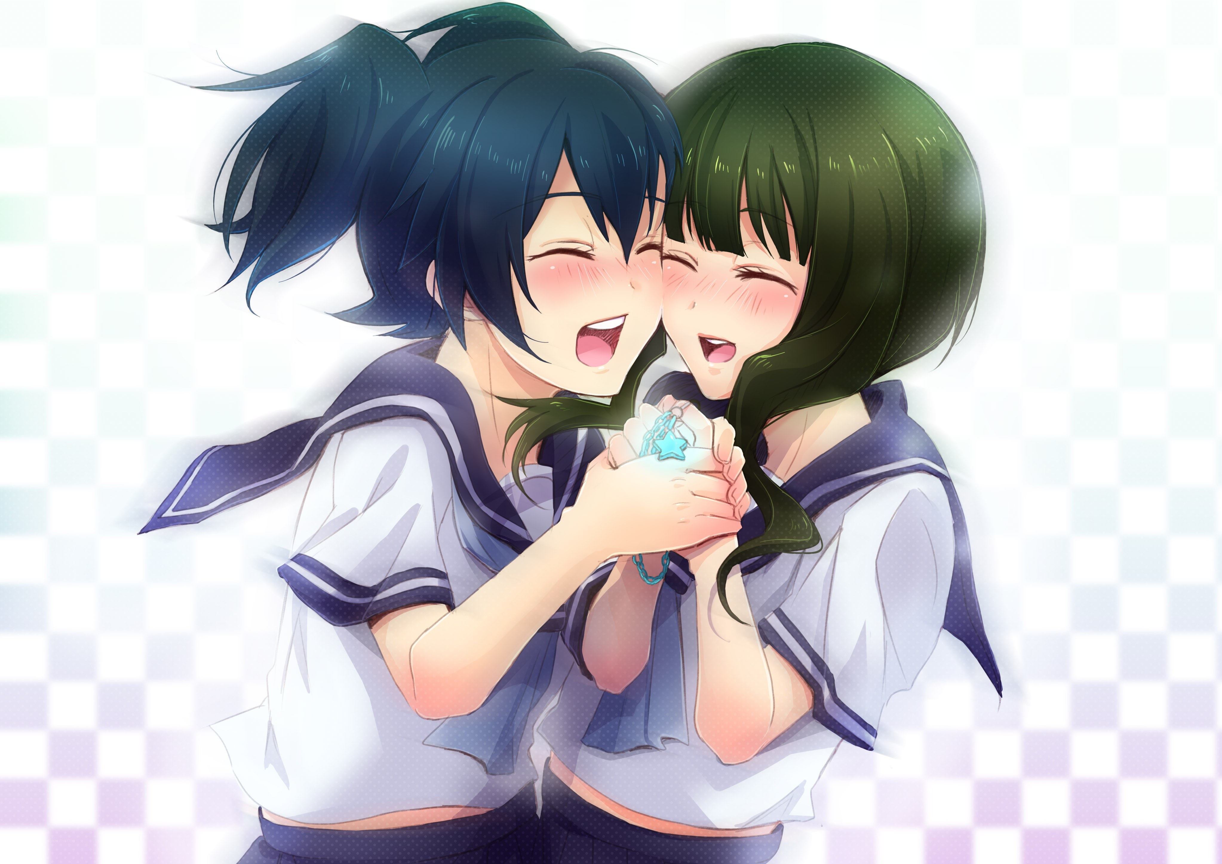 two girls hugging happily