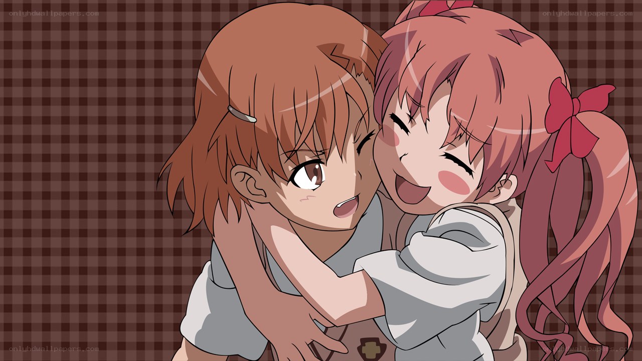 two girls hugging happily