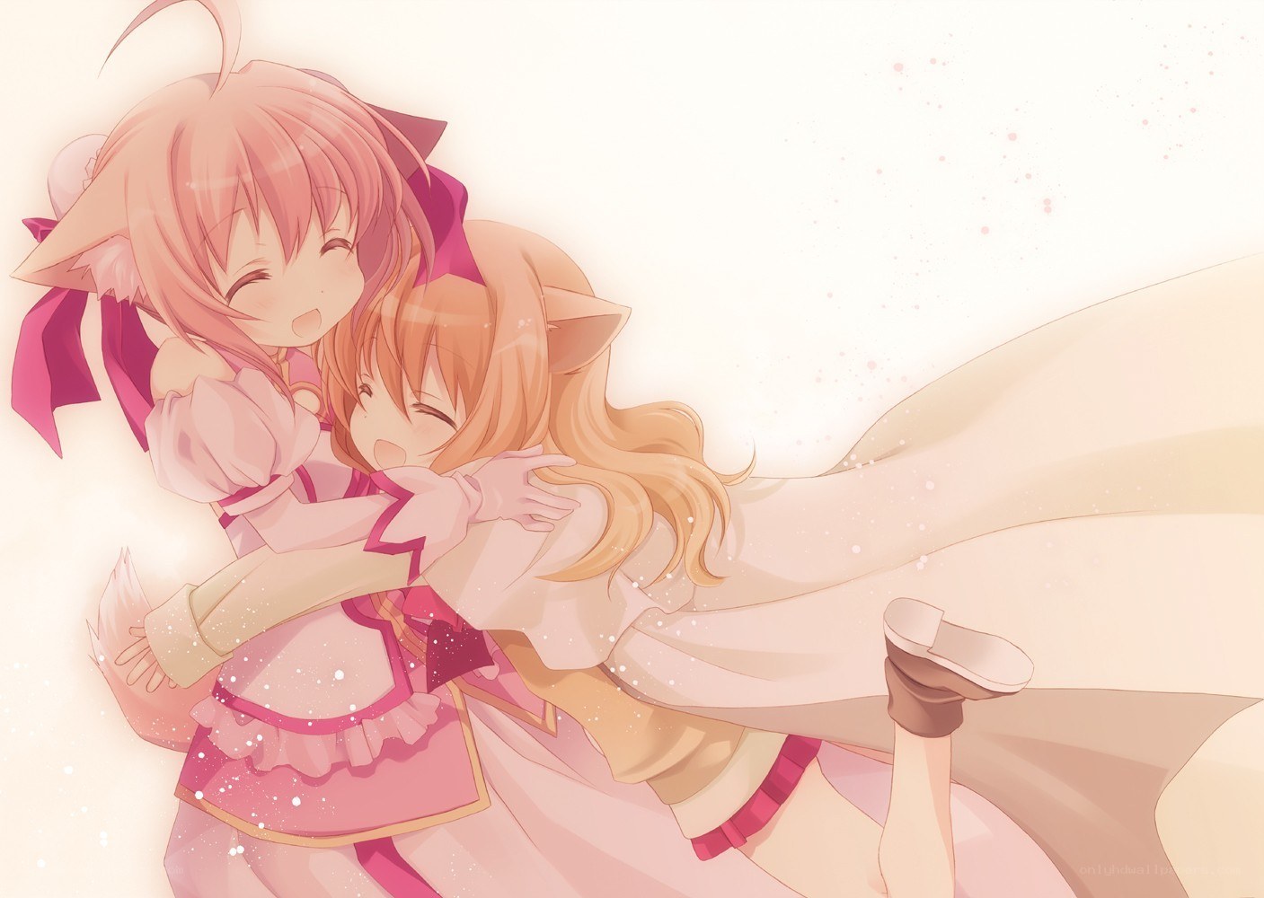 Two girls hugging happily