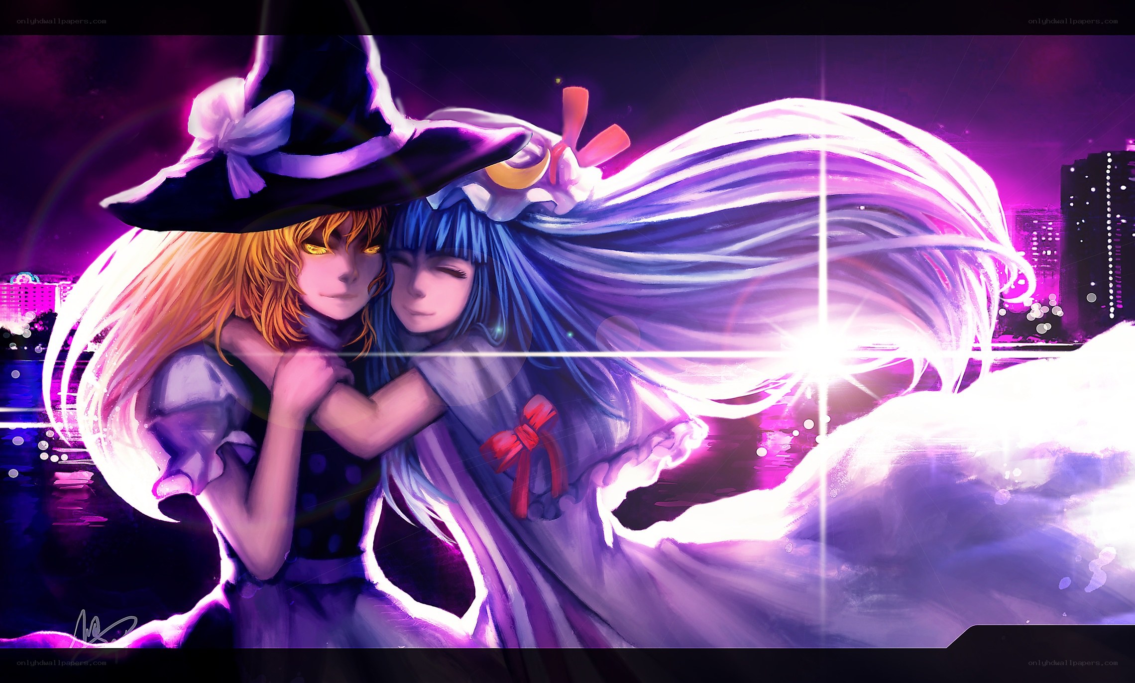 Two girls hugging in a city