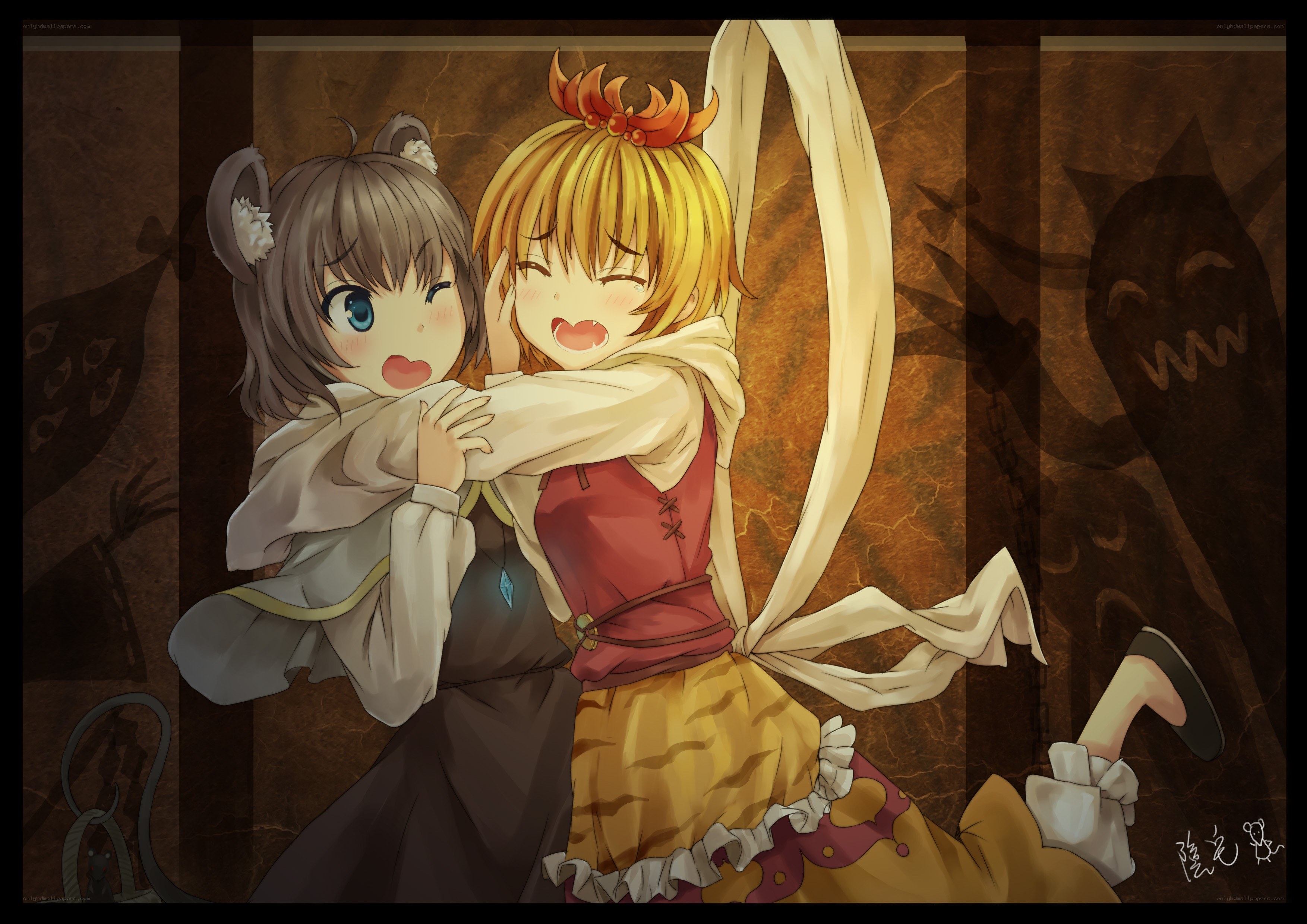 Two girls hugging in a dungeon