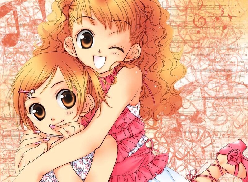 Two girls hugging in a musical scene