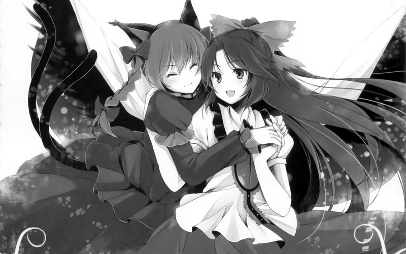 two girls hugging in black and white
