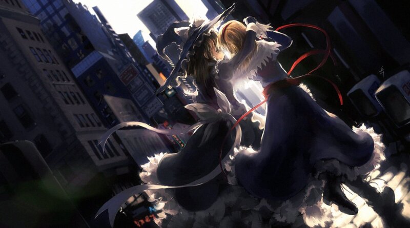 two girls hugging in city