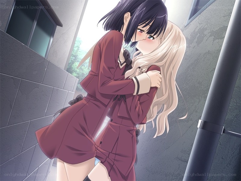 two girls hugging in hallway