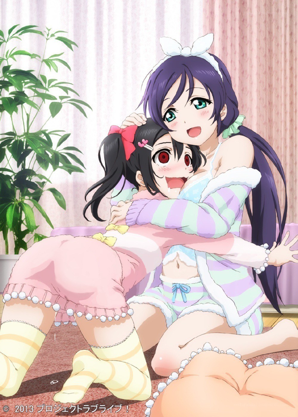 Two girls hugging in pajamas