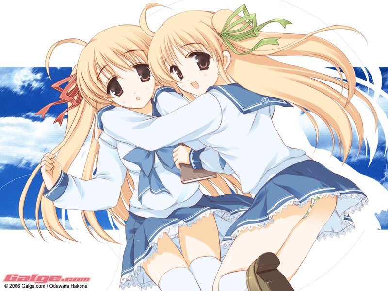 Two girls hugging in school uniforms