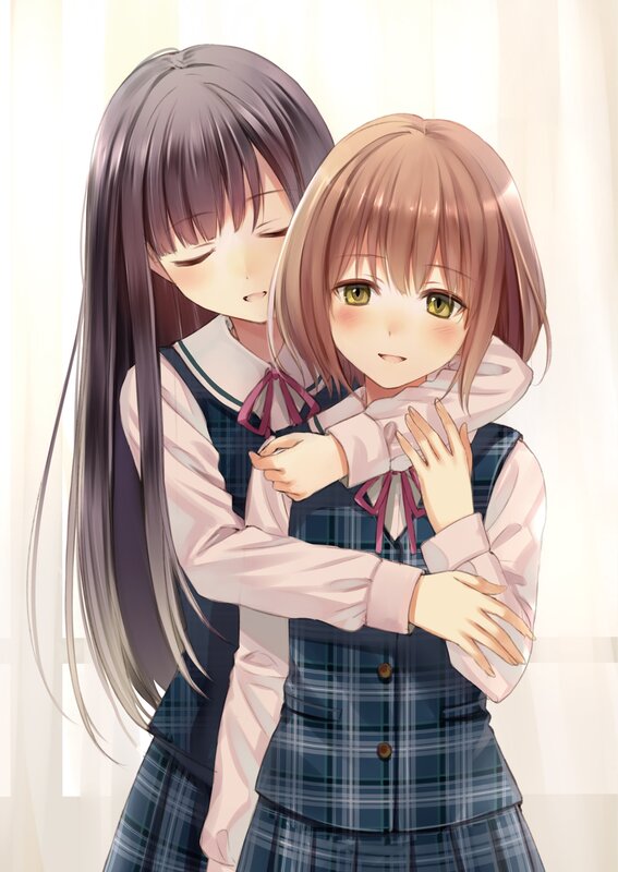 Two girls hugging in school uniforms