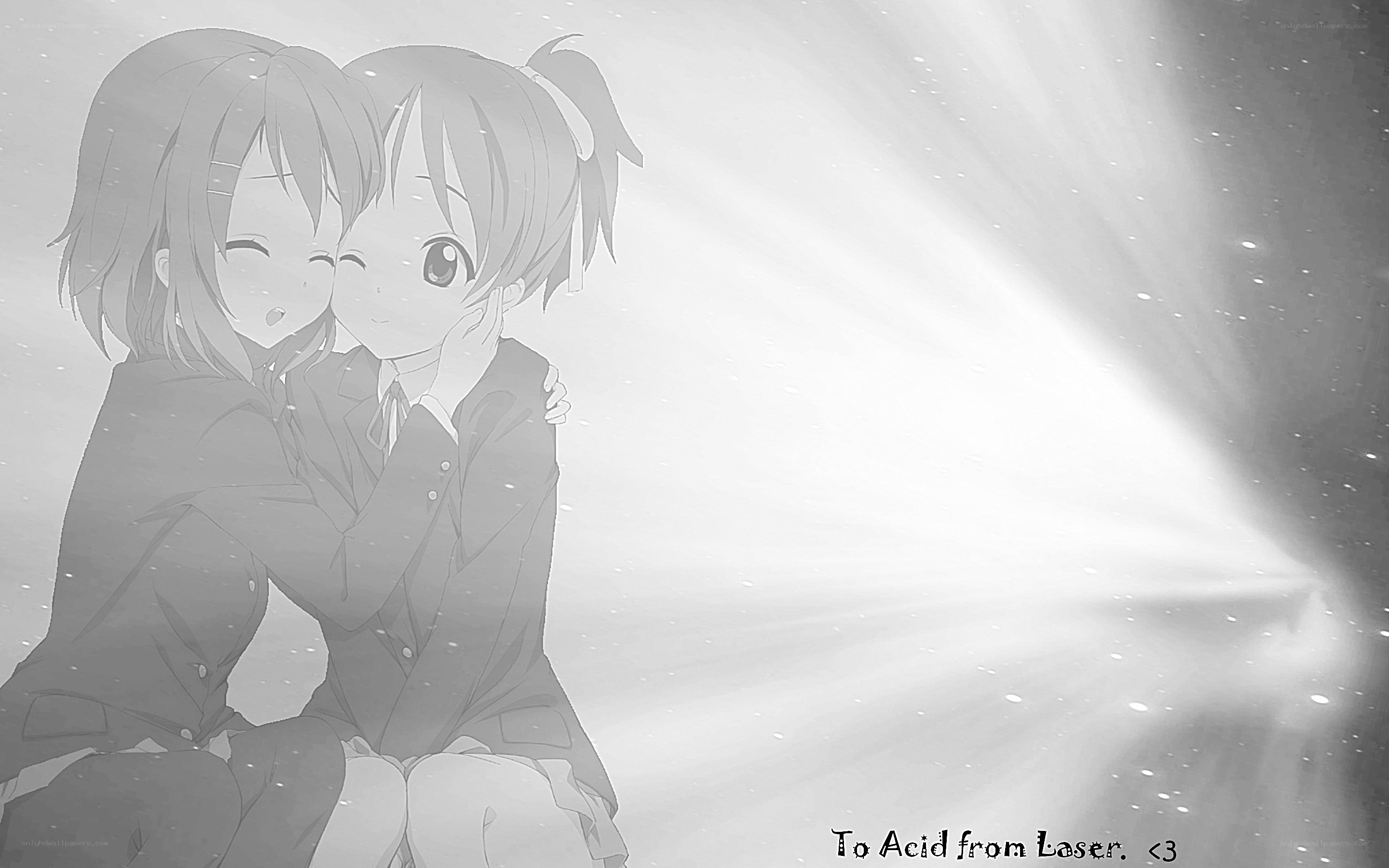two girls hugging in snow
