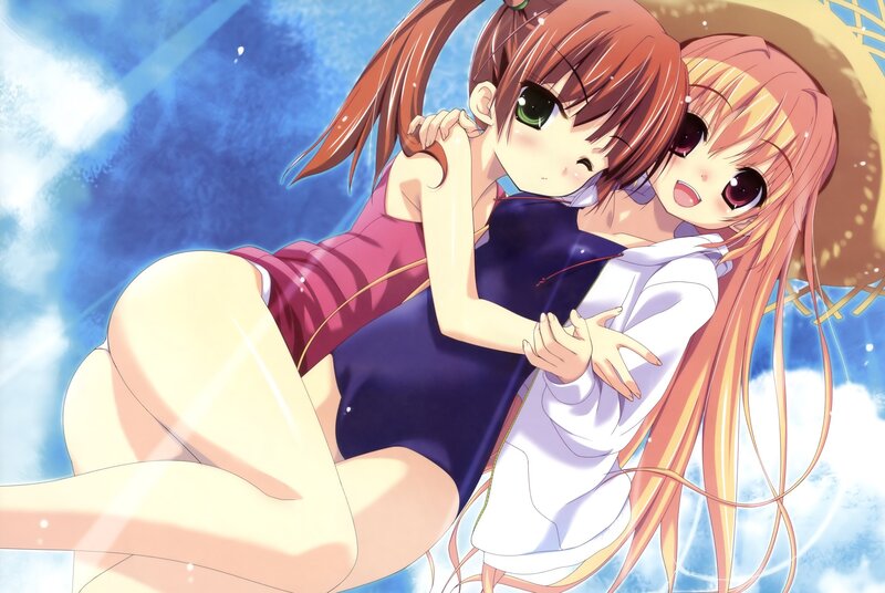 Two girls hugging in swimsuits