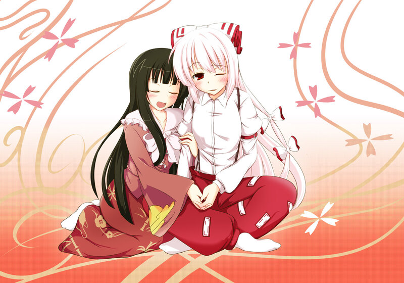 two girls hugging in traditional clothes